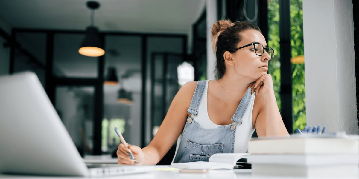 woman doing work with her laptop open