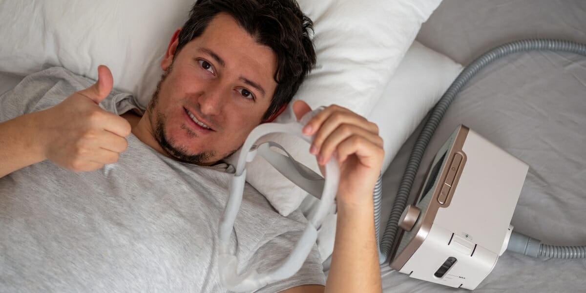man with sleep apnea machine