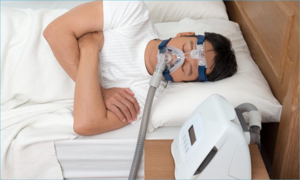 person using cpap machine