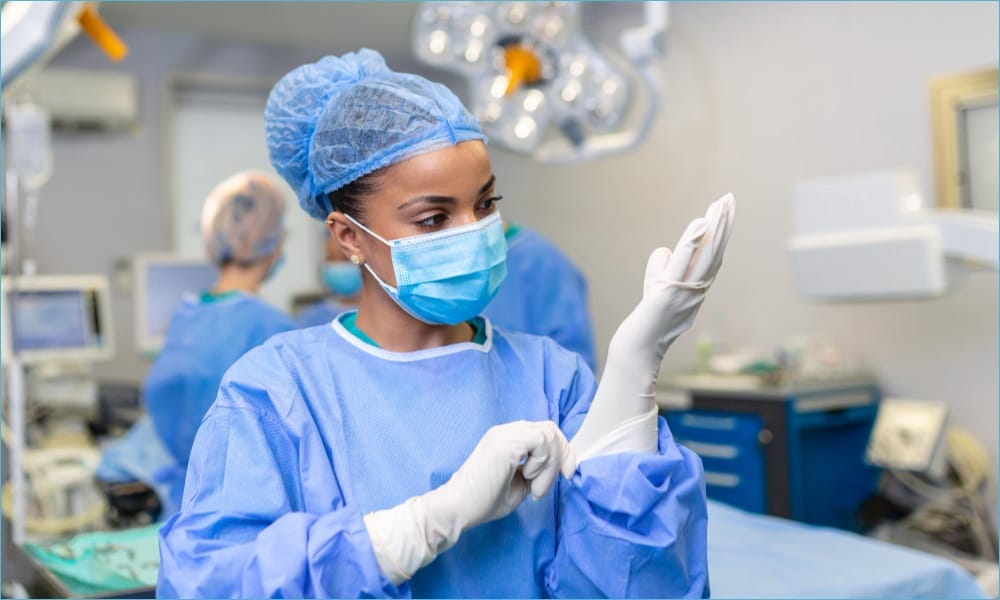 doctor putting gloves on