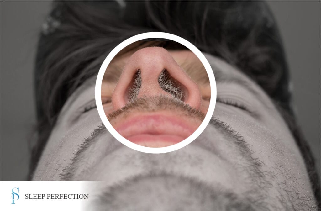A zoomed-in view highlights the nasal passage of a man lying down, emphasizing hair and airway detail
