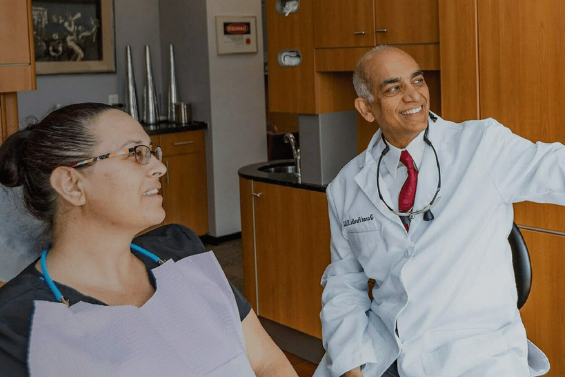 Dr Sharad Pandi consulting patient about sleep apnea and teeth grinding diagnosis
